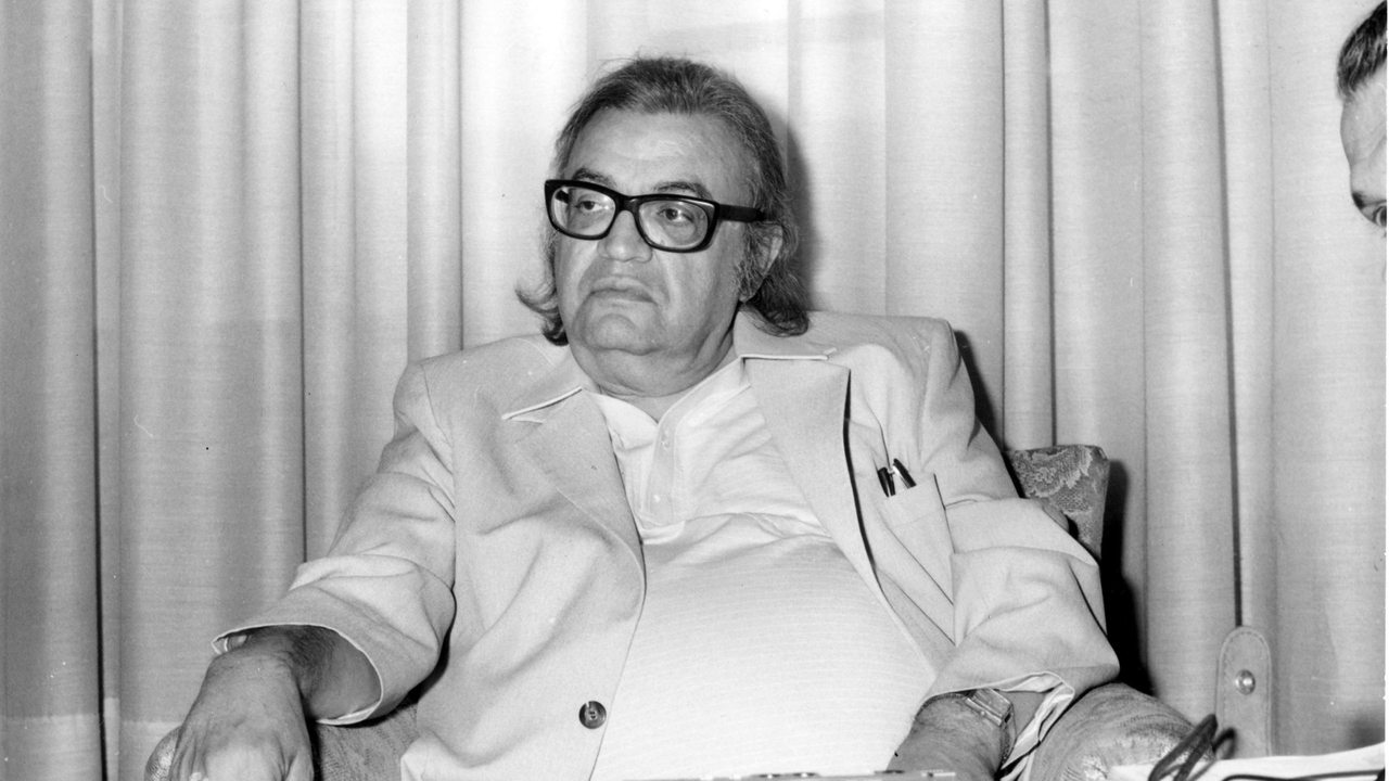 Mario Puzo bei einem Interview mit Journalisten (Archivbild)