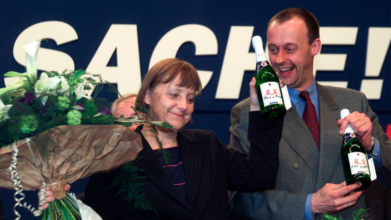 Angela Merkel Nach der Wahl zur Vorsitzenden der CDU neben Friedrich Merz